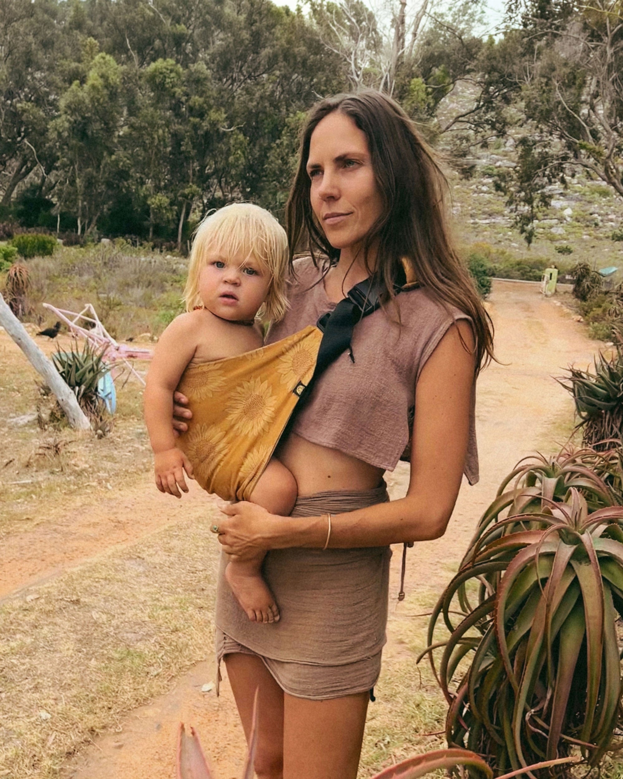 Wildride Sunflower ergonomic toddler carrier for walking with a child outdoors